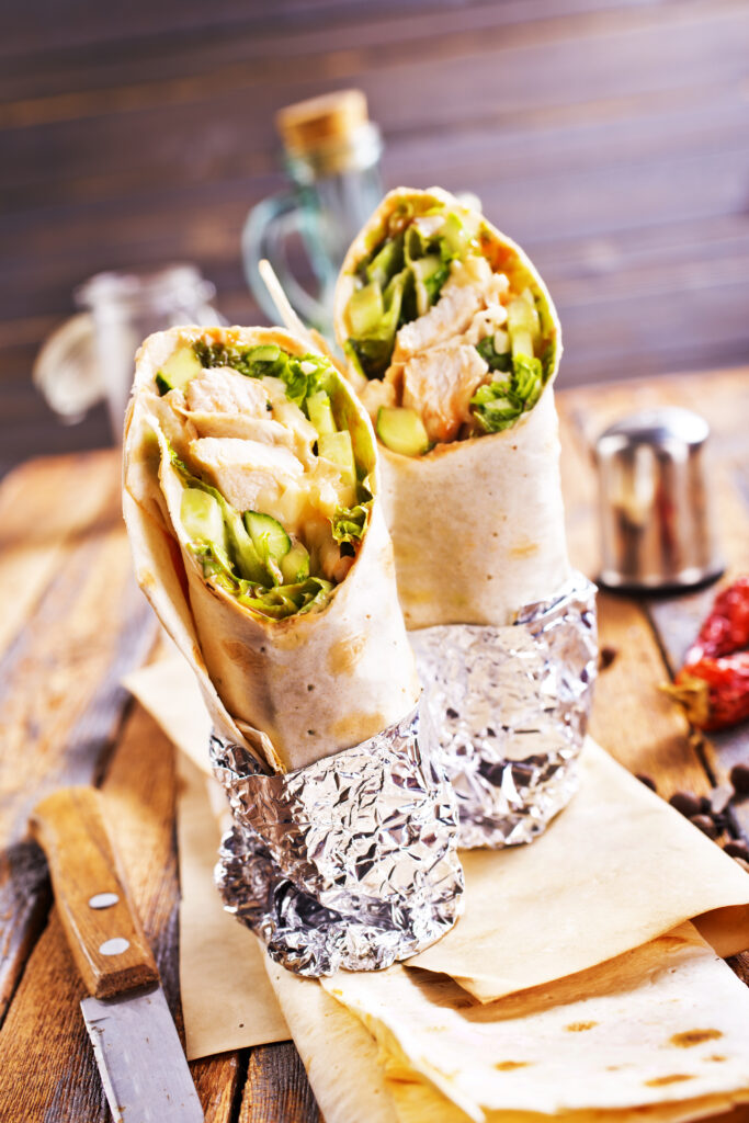 Tortilla wraps with chicken fillet and vegetables. Selective focus